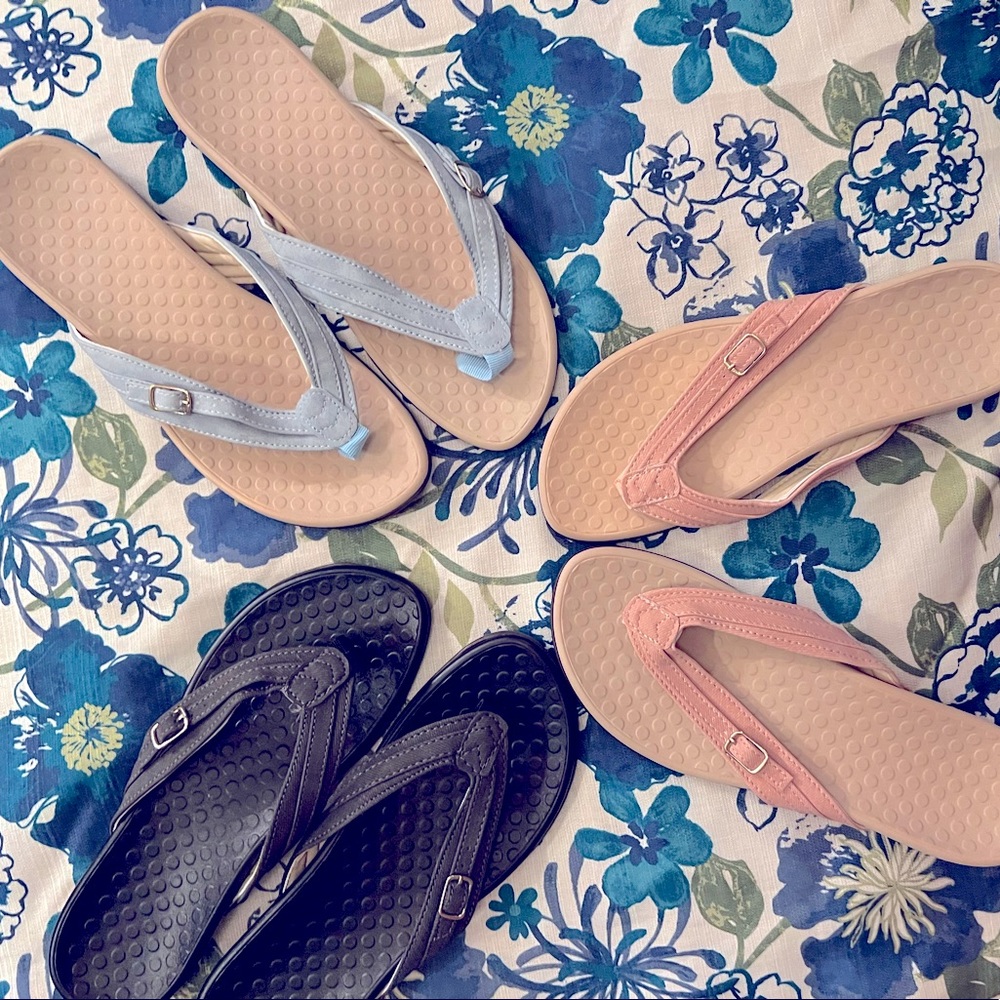 Three pairs of Flip flops. NWOT.